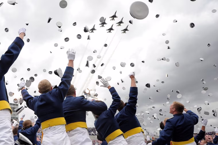 Air Force cadets celebrate during their graduation ceremony at the U.S. Air Force Academy in Colorado Springs, Colo. on May 23.