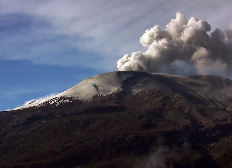 A plume of smoke billows on May 29, from the Nevado del Ruiz volcano, located on the border of the departments of Caldas and Tolima in Colombia, some 130 km west of Bogota in this picture from the Colombian Geological and Mining Institute. Colombian authorities have elevated the alert status in the area to orange due to an increase in the volcano's activity.