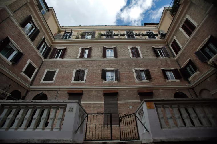 The building where Reid is alleged to have stabbed Malpeso is not far from the Coliseum in central Rome.
