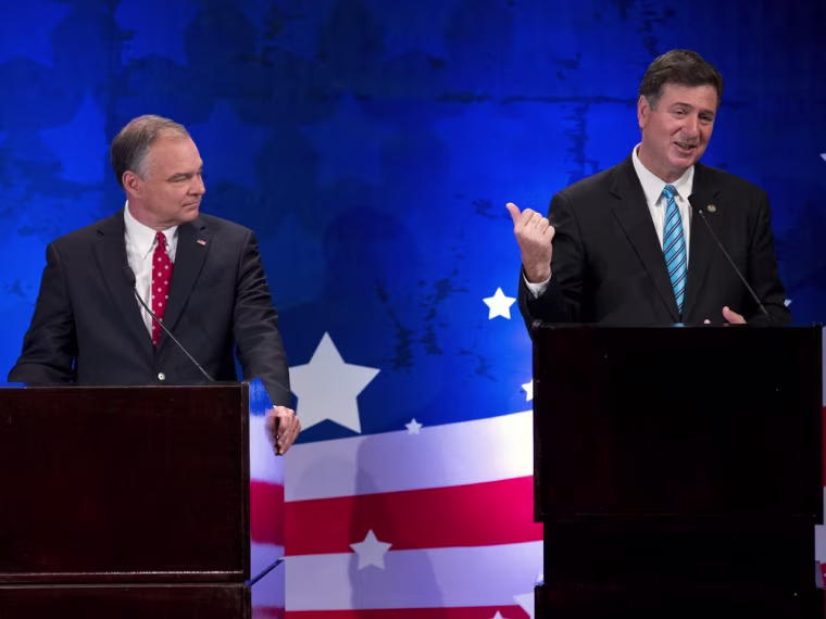 Republican candidate George Allen, right, speaks as Democratic candidate Tim Kaine looks on during a Senatorial debate for the Virginia U.S. Senate seat on Thursday, Sept. 20, 2012 in McLean, Va.