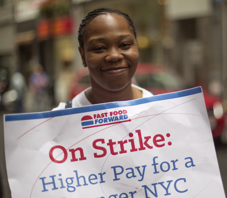 \"You're trying to go up and you're just going down,\" said protester Shantel Walker, 31, of Brooklyn who makes $7.25 working at a Papa John's in Manhat...