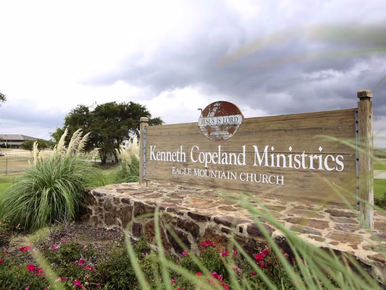A sign marks the entrance of the Kenneth Copeland Ministries Eagle Mountain Church, Tuesday, Aug. 27, 2013, in Newark, Texas. The Texas megachurch is...