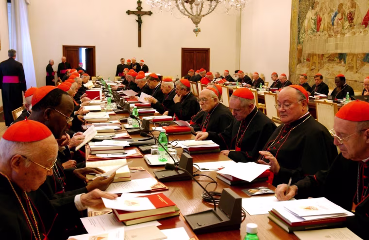 Cardinals congregate in April 2005 in the Bologna Hall at the Vatican ahead of their election of Cardinal Joseph Ratzinger as Pope Benedict XVI.
