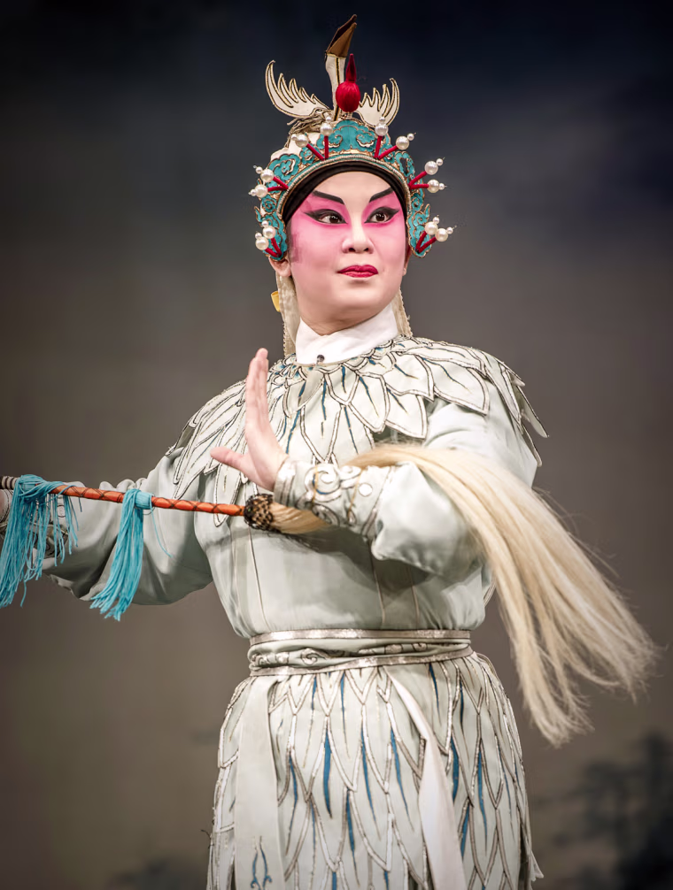An actor performs at the Bamboo Theater.