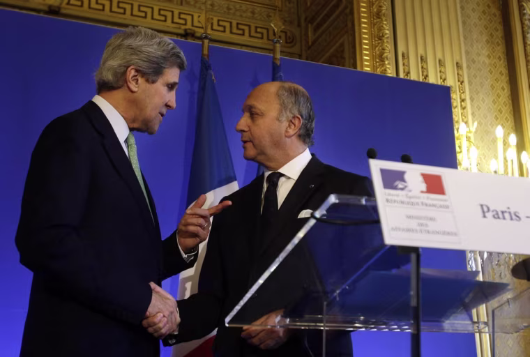 Secretary of State John Kerry, left, shakes hands after a news conference with French Minister of Foreign Affairs Laurent Fabius at the Foreign Ministry in Paris on Wednesday.