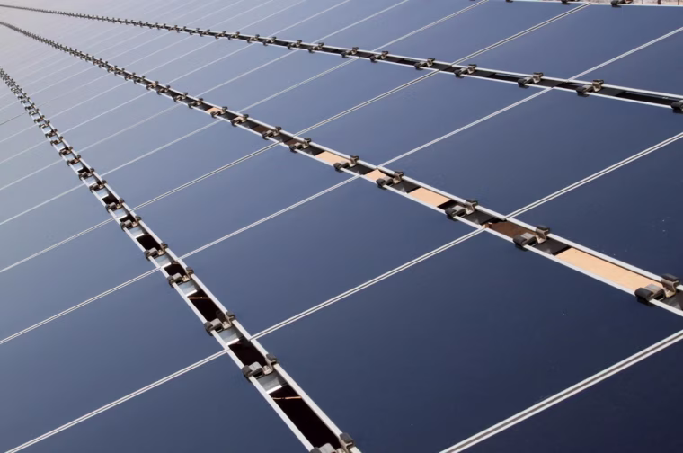 Solar panels at a 2-megawatt photovoltaic array in Albuquerque, N.M. are shown. Charged quantum dots could increase the efficiency of solar cells by 45 percent, according to researchers.