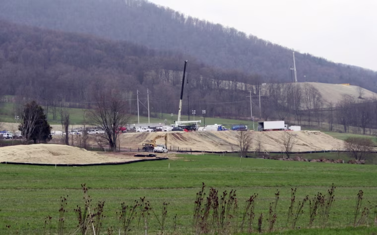 This file photo shows the outside of a natural gas drill site owned by Chesapeake Energy in Leroy Township, Pa.