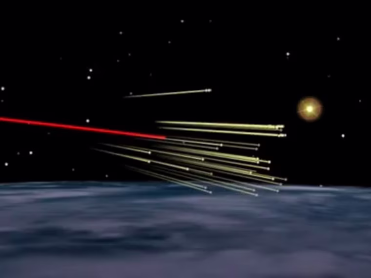 An illustration by Analytical Graphics Inc. shows the UARS satellite breaking up in the upper atmosphere.