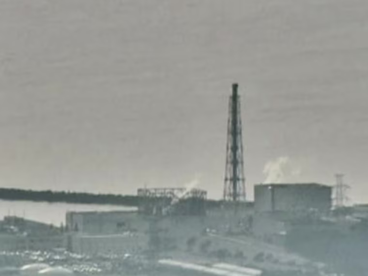 Smoke rises from the nuclear reactors of Japan's Fukushima Dai-ichi nuclear power plant in an NHK video image from Thursday.