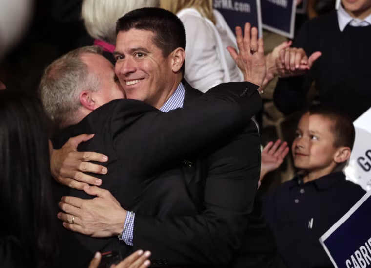 Republican candidate for the U.S. Senate, Gabriel Gomez, center, celebrates with supporters as he makes his way to the stage to address an audience with a victory speech at a watch party, in Cohasset, Mass., Tuesday, April 30, 2013.