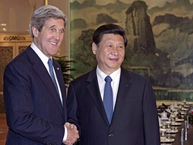 U.S. Secretary of State John Kerry, left, is greeted by Chinese President Xi Jinping in Beijing on April 13. Xi has made battling corruption a top theme of his administration, warning the problem is so severe it could threaten his party's survival.