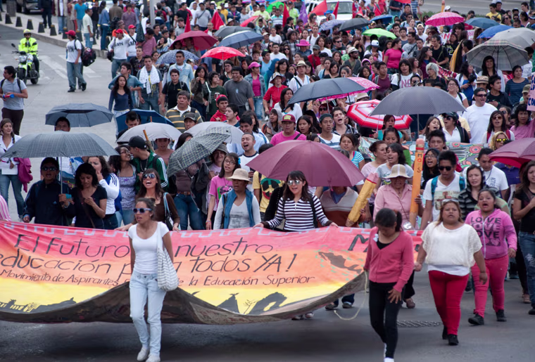 Young people in Mexico, who have formed the Movement of Candidates Excluded from Higher Education (MAES in Spanish) are demanding placement in institutions of higher learning -- positions that the Secretary of Public Education insists do not exist. Here they are seen marching in Mexico City on Aug.17, 2013.