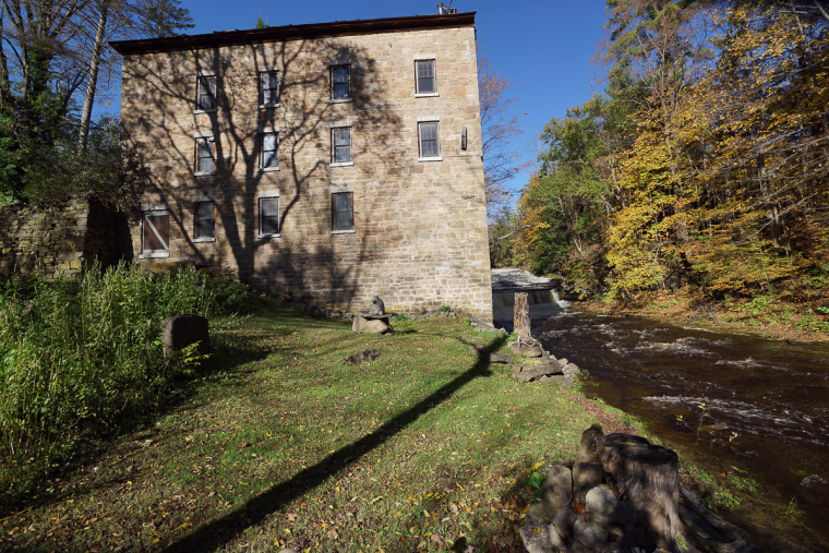 This four-story former mill is set along waterfalls in St. Johnsville, N.Y.