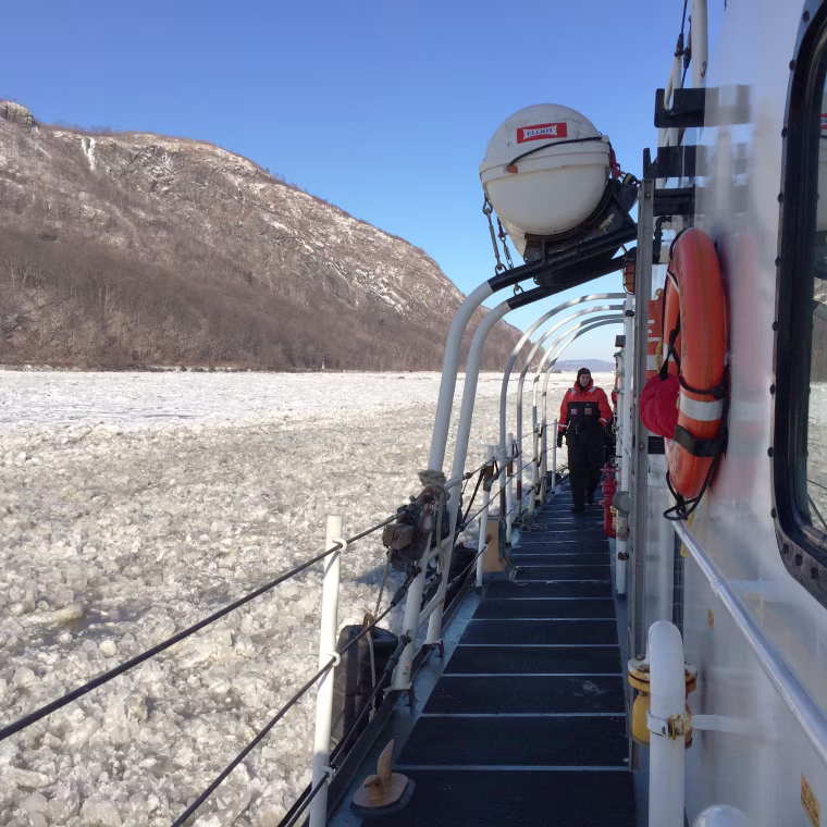 The U.S. Coast Guard Cutter Sturgeon Bay breaks through ice on the Hudson River in order to keep commerce moving.
