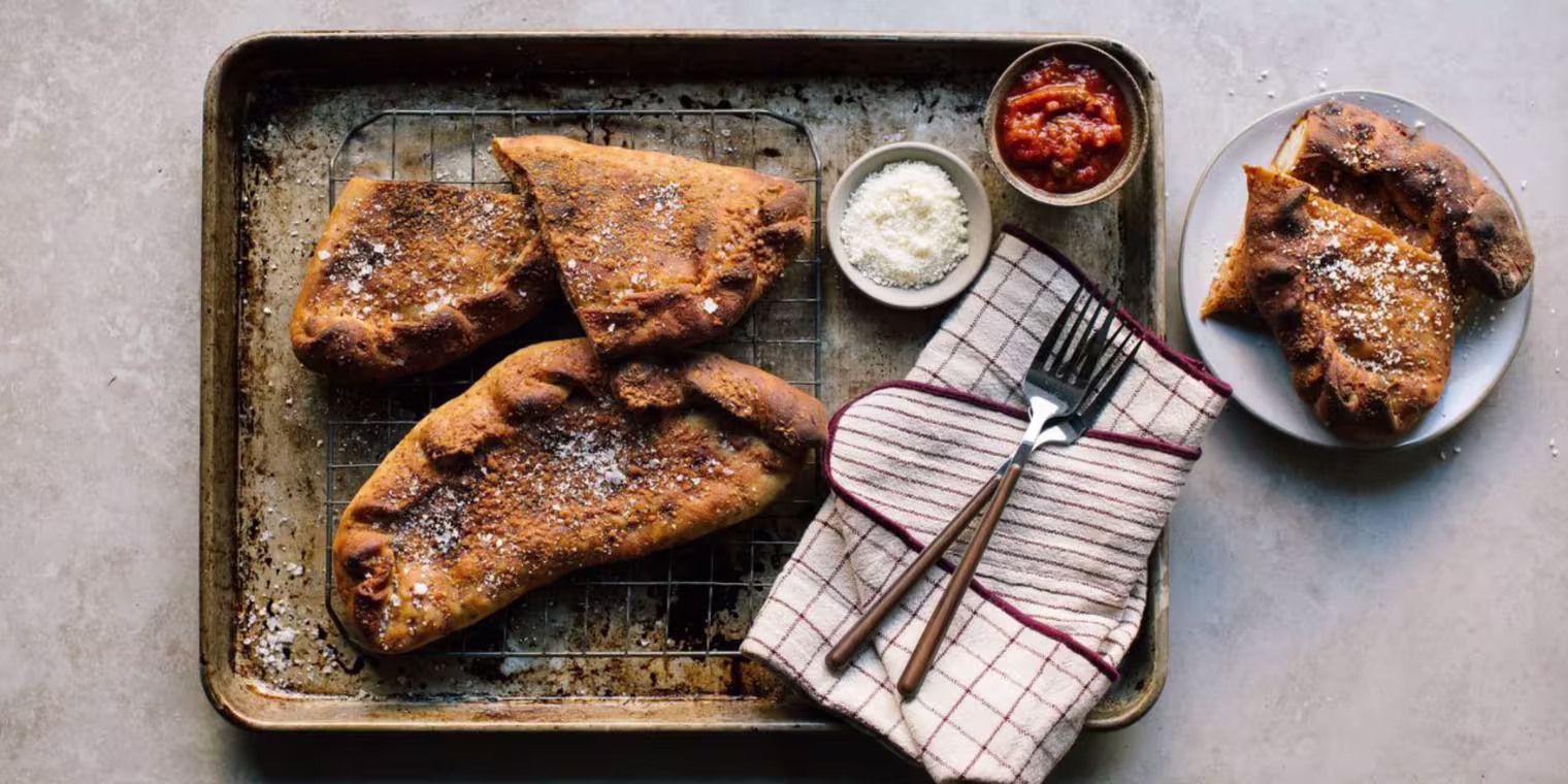 The ultimate game day snack? Sausage, pepper and onion calzones