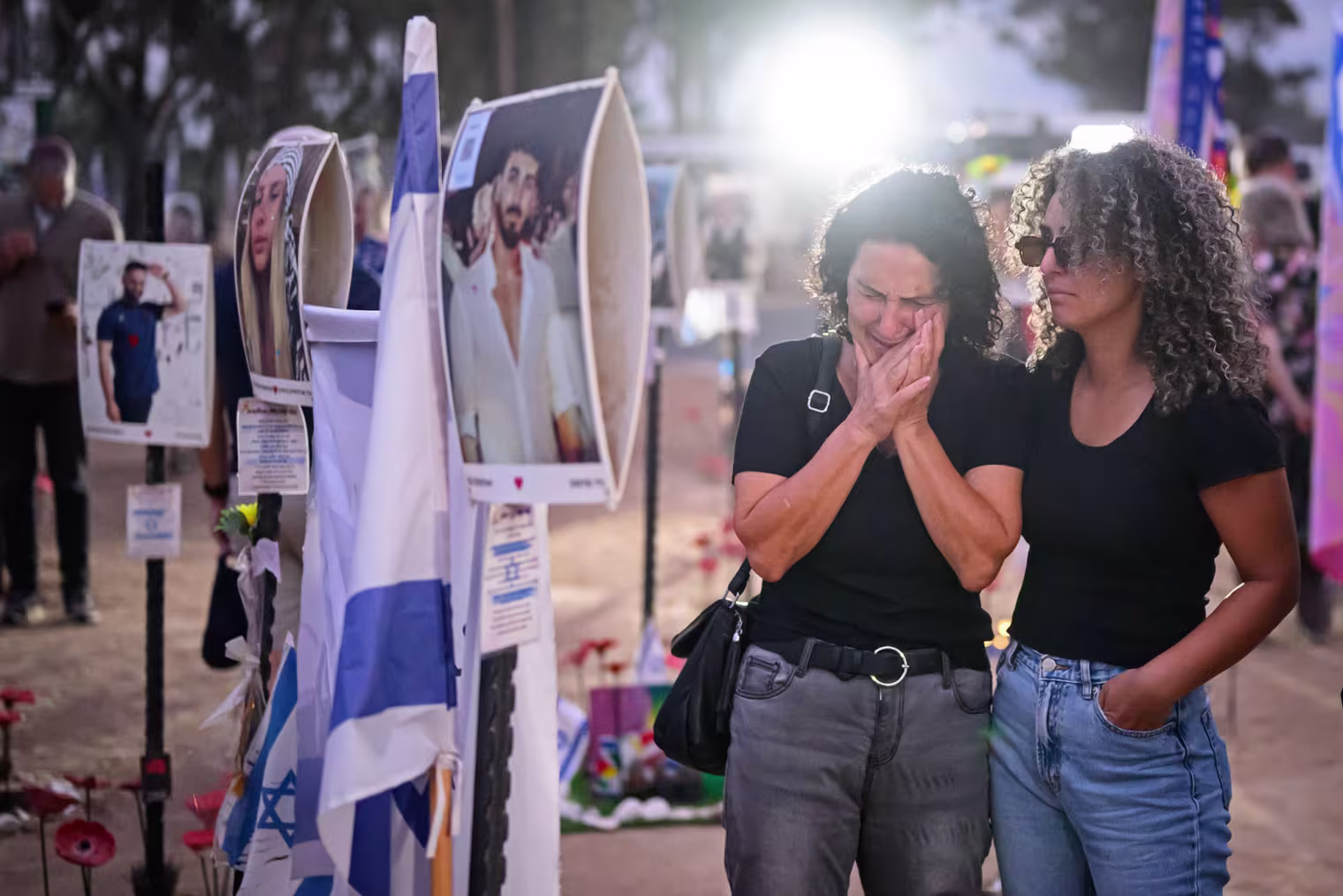 Loved ones of the lost and kidnapped gather at the site of the Nova Festival 
