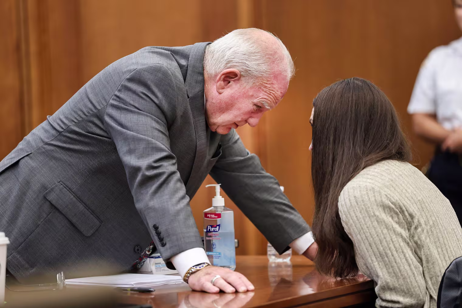 Kevin Reddington talks with Lindsay Clancy after jury question.