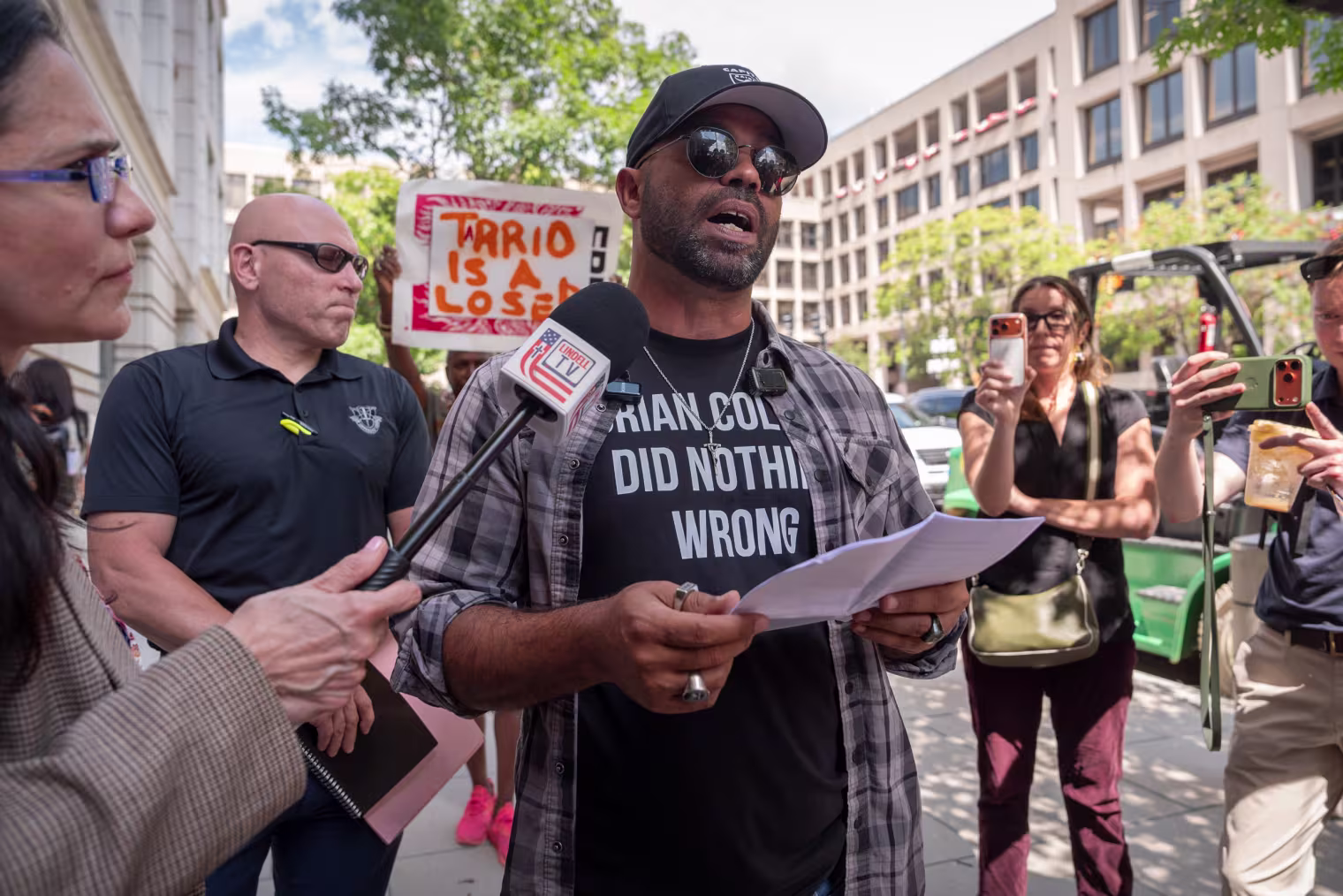 Enrique Tarrio speaks outside federal court