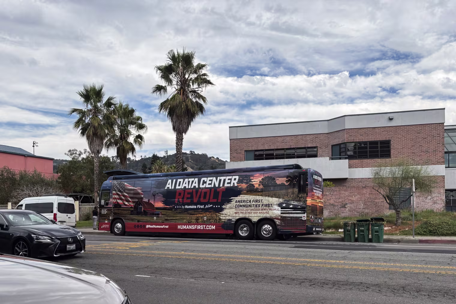 The tour bus used by Humans First seen on the street.