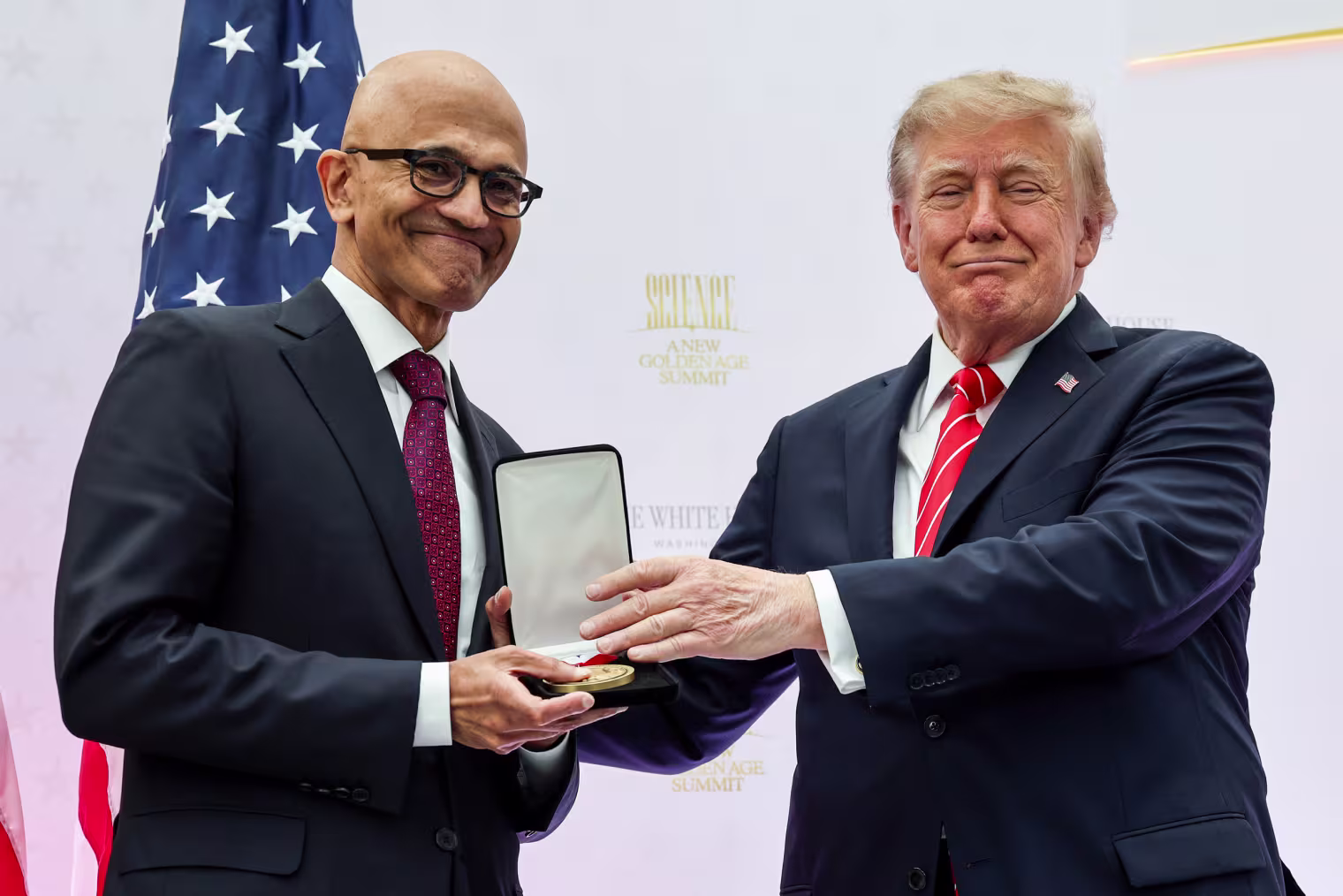 CEO of Microsoft Satya Nadella, left, receives the National Medal of Technology and Innovation from U.S. President Donald Trump.