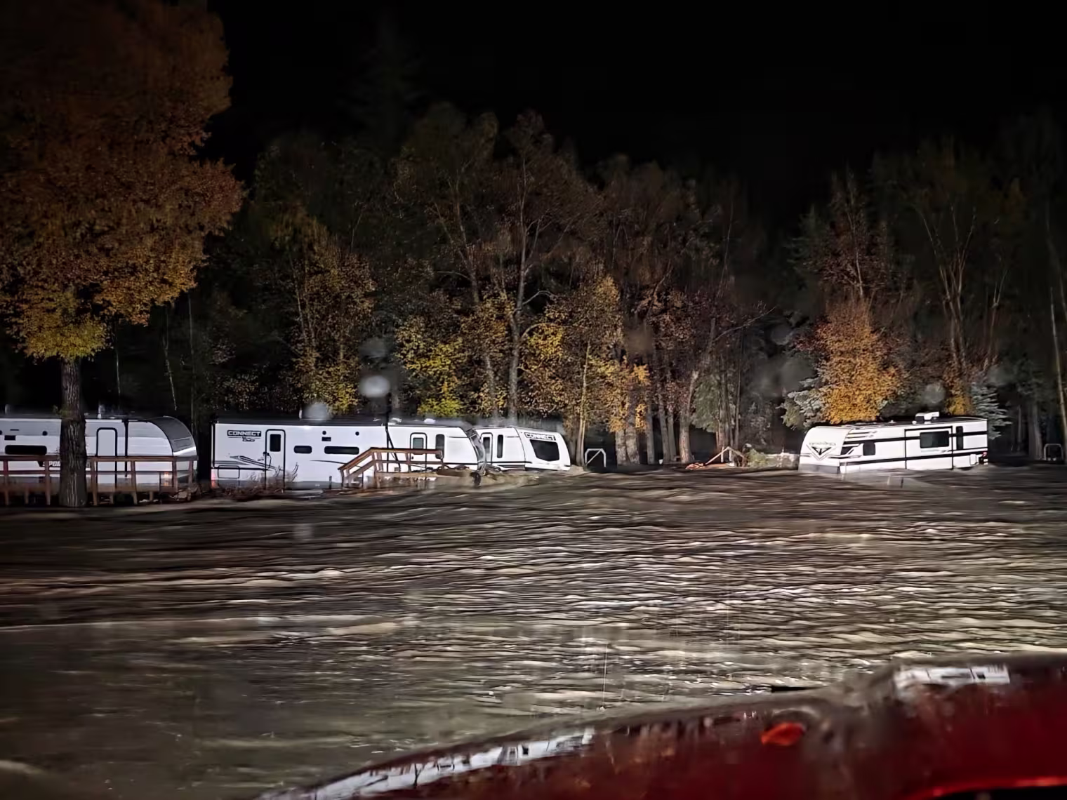 New Mexico crews scour evacuated neighborhoods after floods, tornado