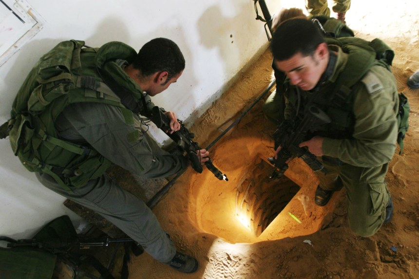 Israeli soldiers inspecting tunnels utilized by Hamas for smuggling weapons in 2004.