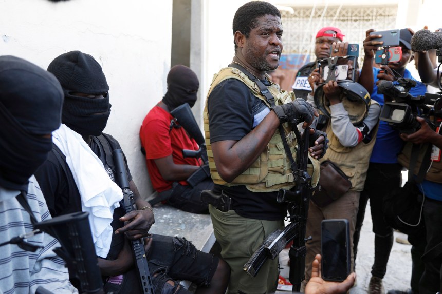 As gangs take control the nation, Haiti's leader steps down.