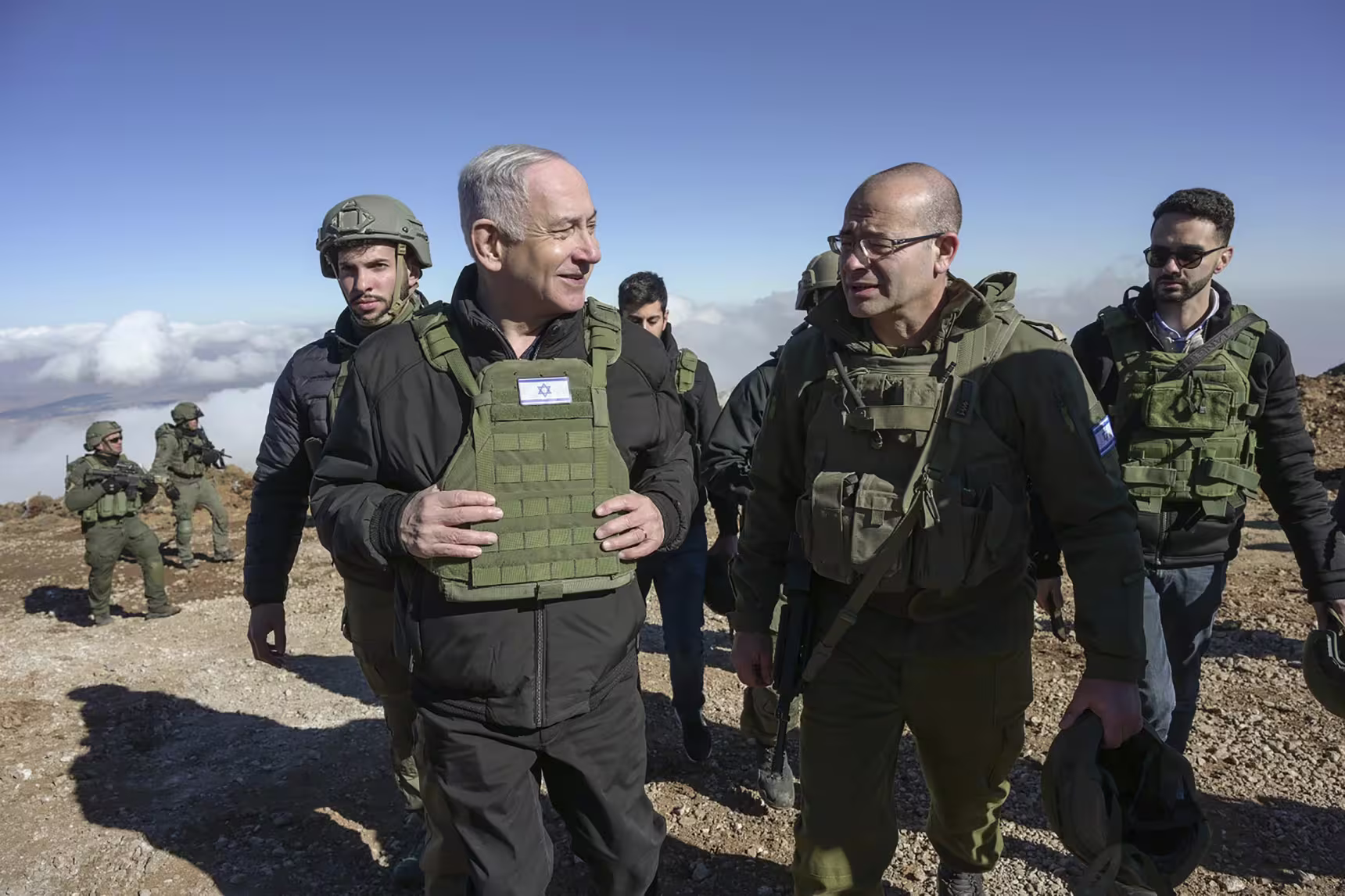 Israeli Prime Minister Benjamin Netanyahu visits a buffer zone inside Syria on Tuesday