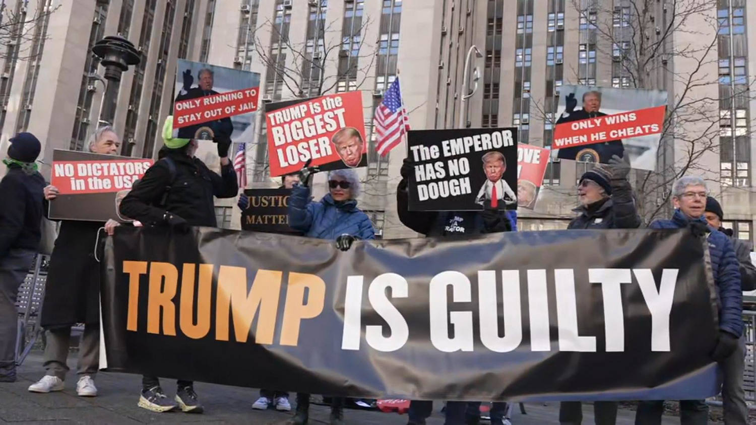 Protesters rally outside New York courthouse as Trump attends hush money hearing