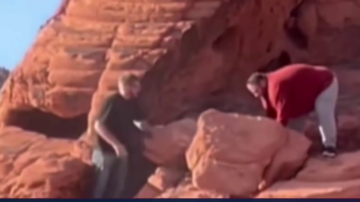 Video shows men damaging ancient rocks in national park