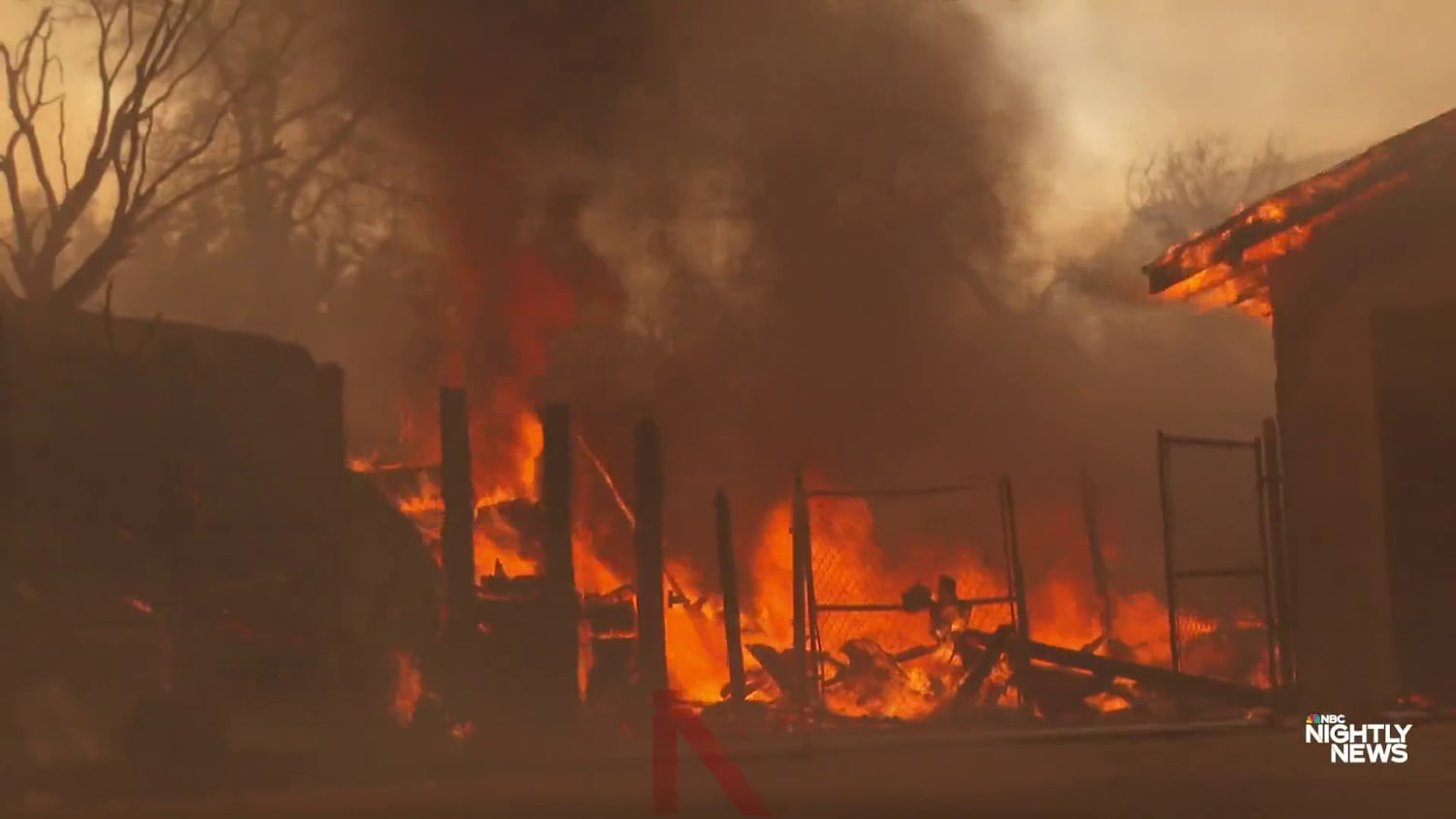Firefighters battle massive California wildfire amid blistering heat