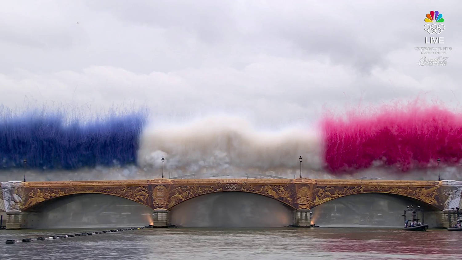 Watch: French flag-colored plumes of smoke burst from Paris bridge at Olympics opening ceremony