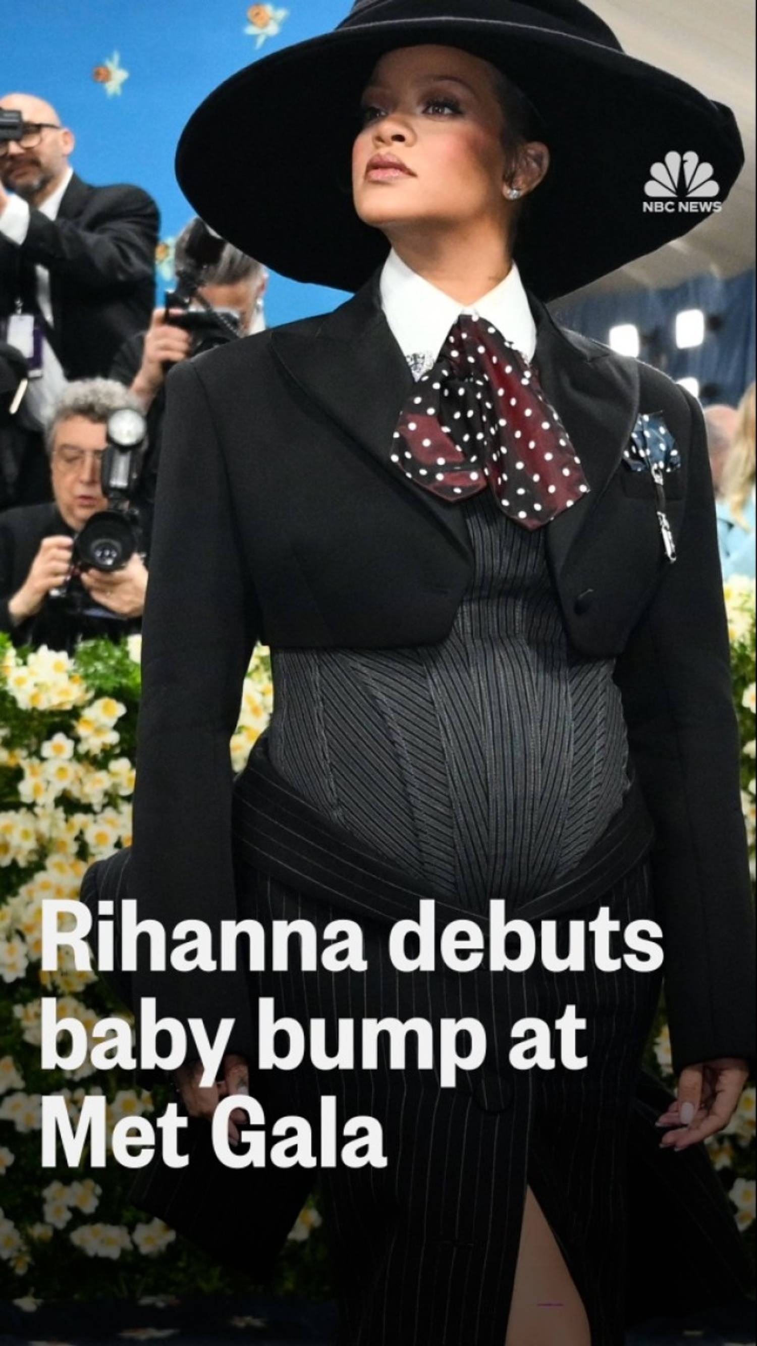 Rihanna debuts baby bump at the Met Gala