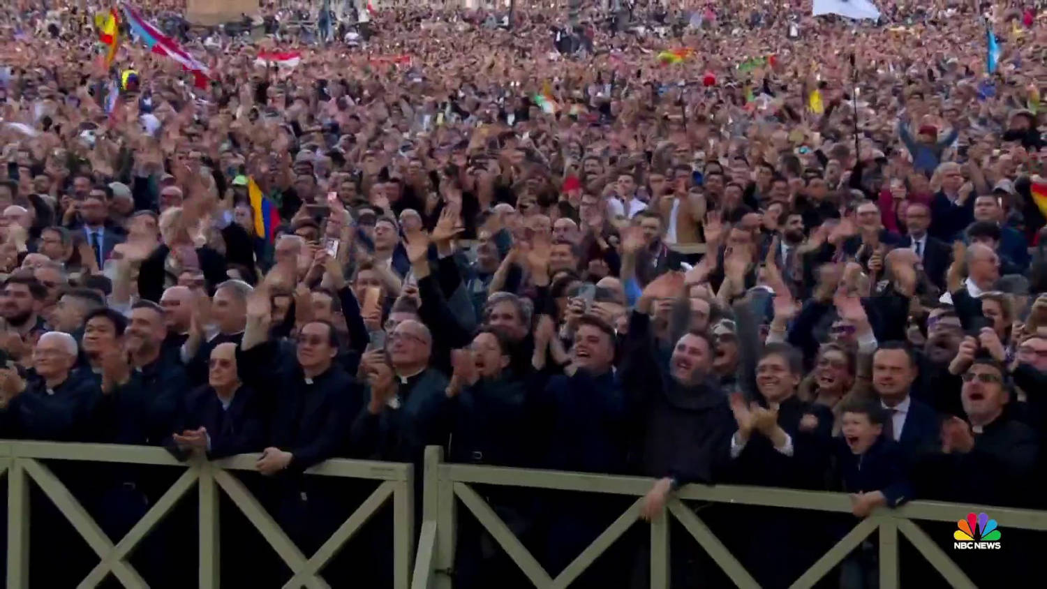 Vatican crowds react to the announcement of a new pope.