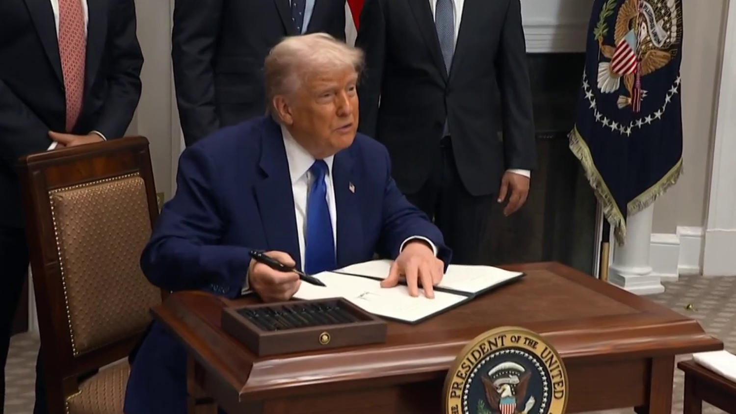Trump signs order pushing companies to lower prescription drug prices