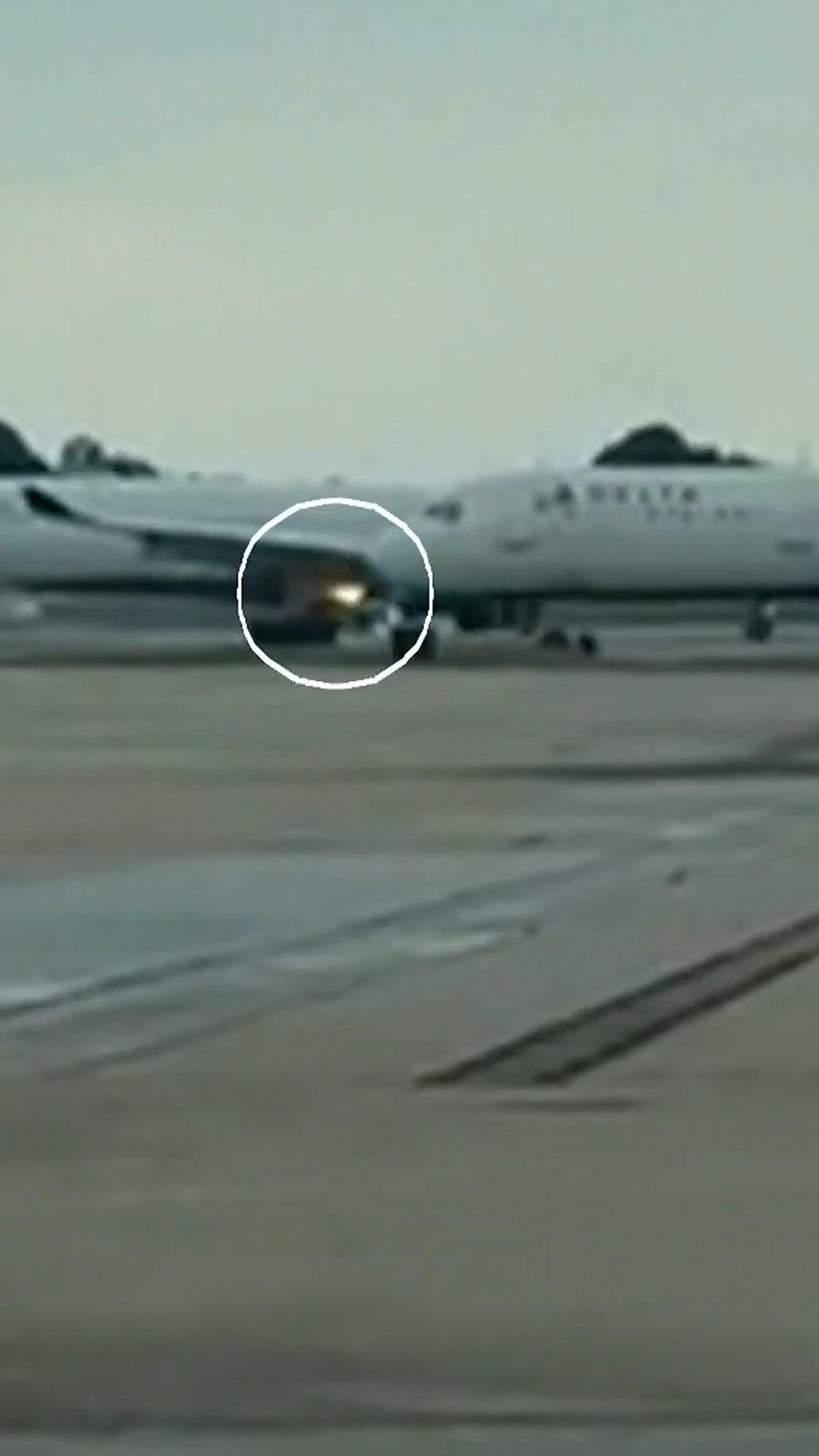 Delta plane engine catches fire on airport runway
