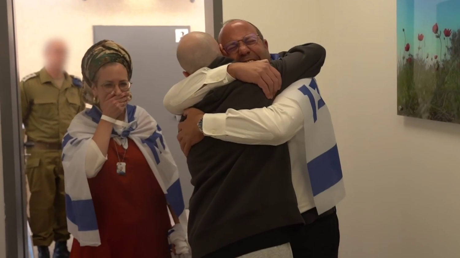 Returned hostage Eitan Mor reunites with his family