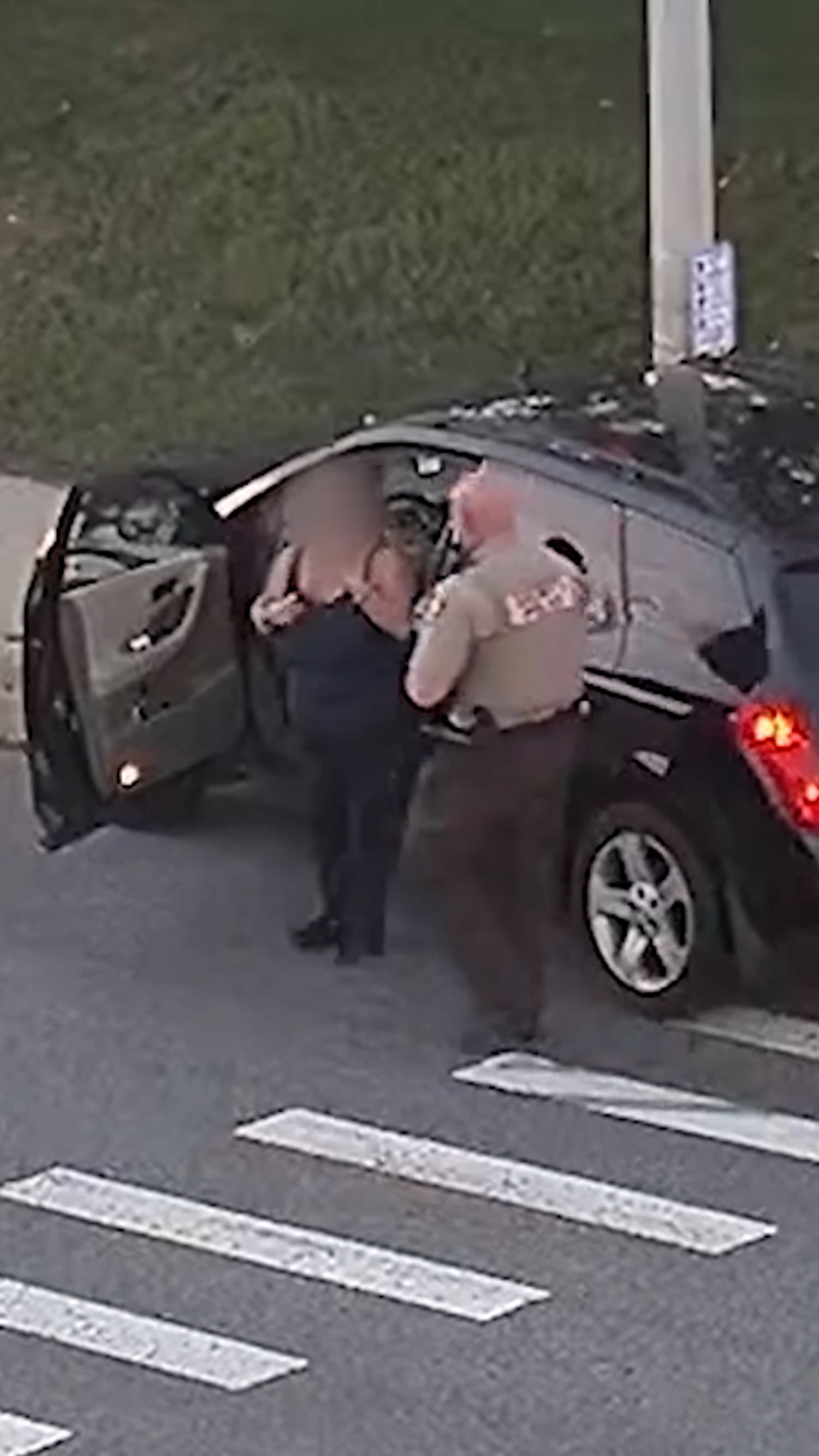 Woman choking while driving saved by officer