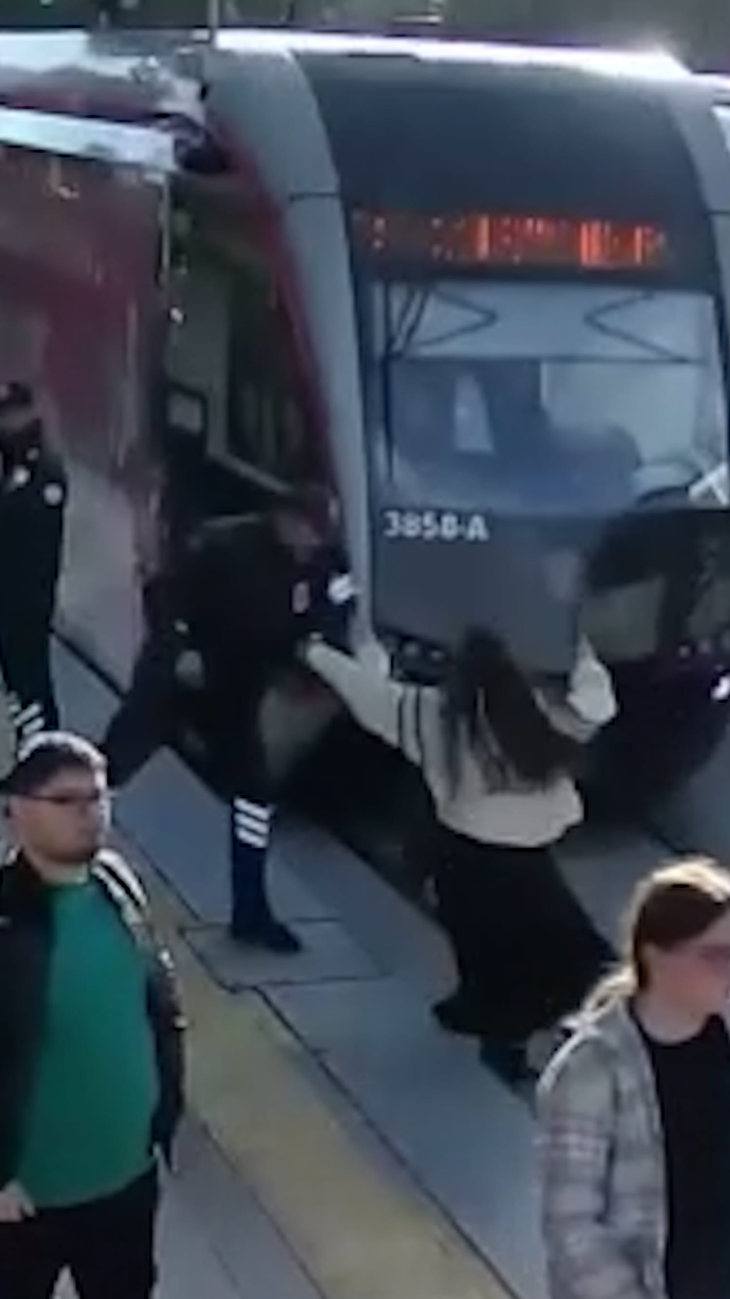 Security guard rescues woman from path of oncoming tram