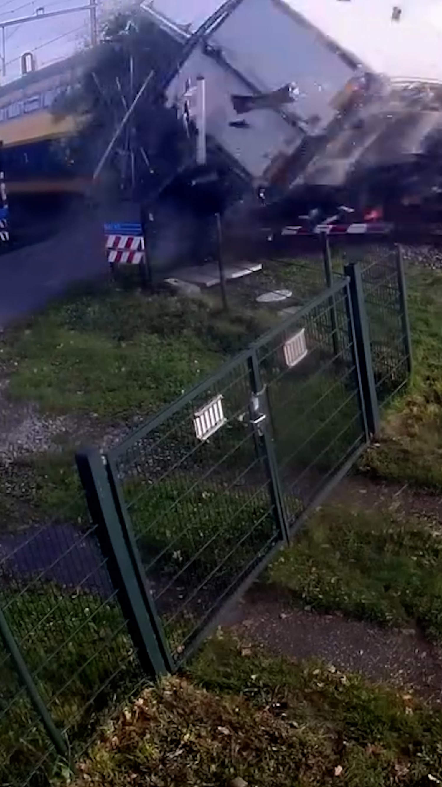 Train collides with truck at Dutch railroad crossing