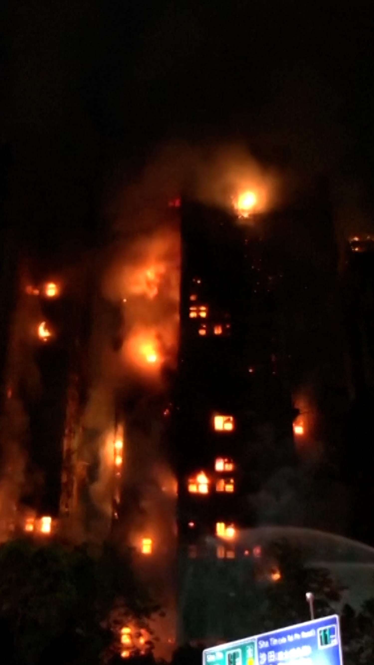 Fire engulfs high-rises killing at least 4 in Hong Kong