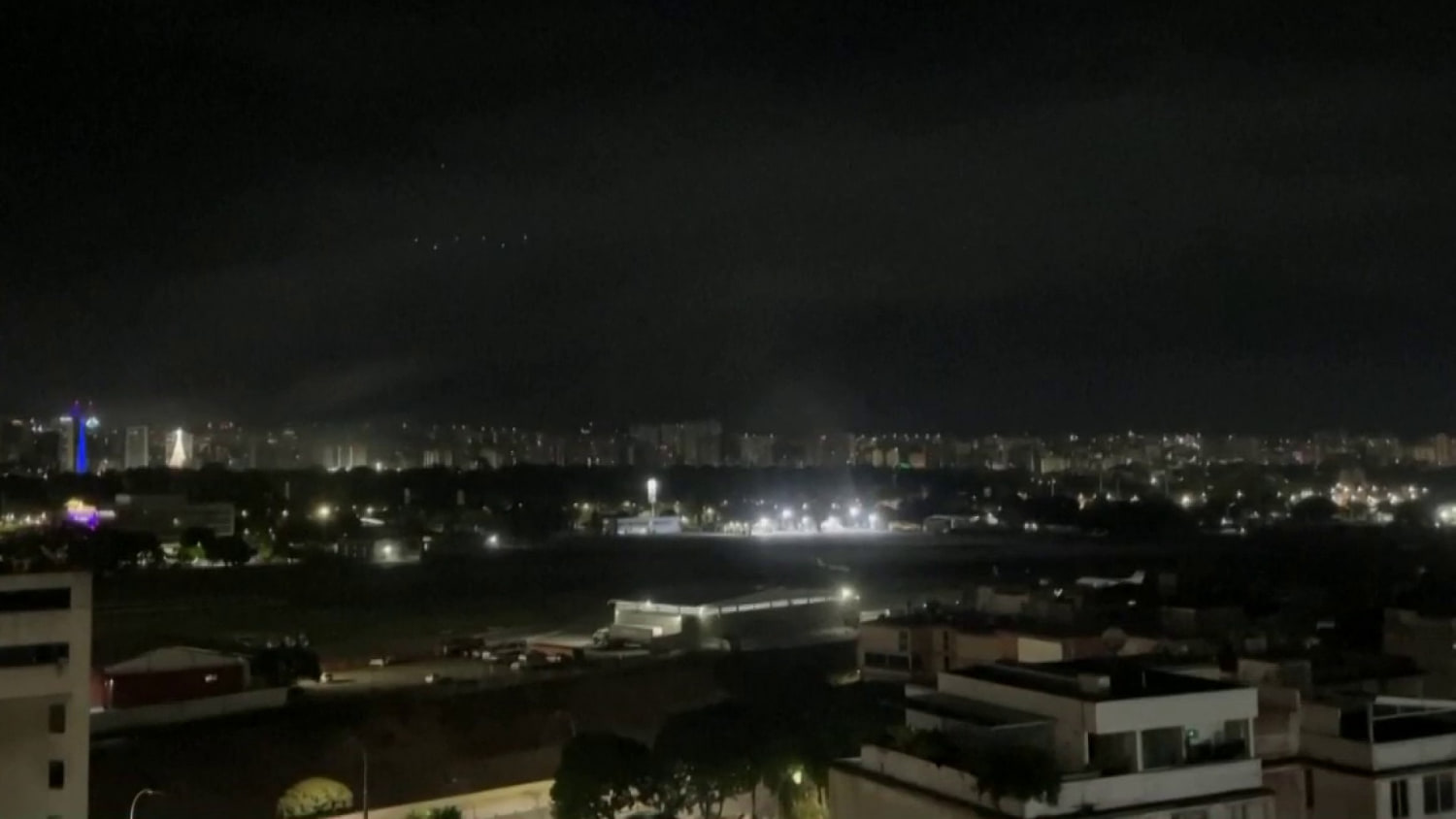 Residents in Caracas report power outages, helicopters overhead as explosions heard