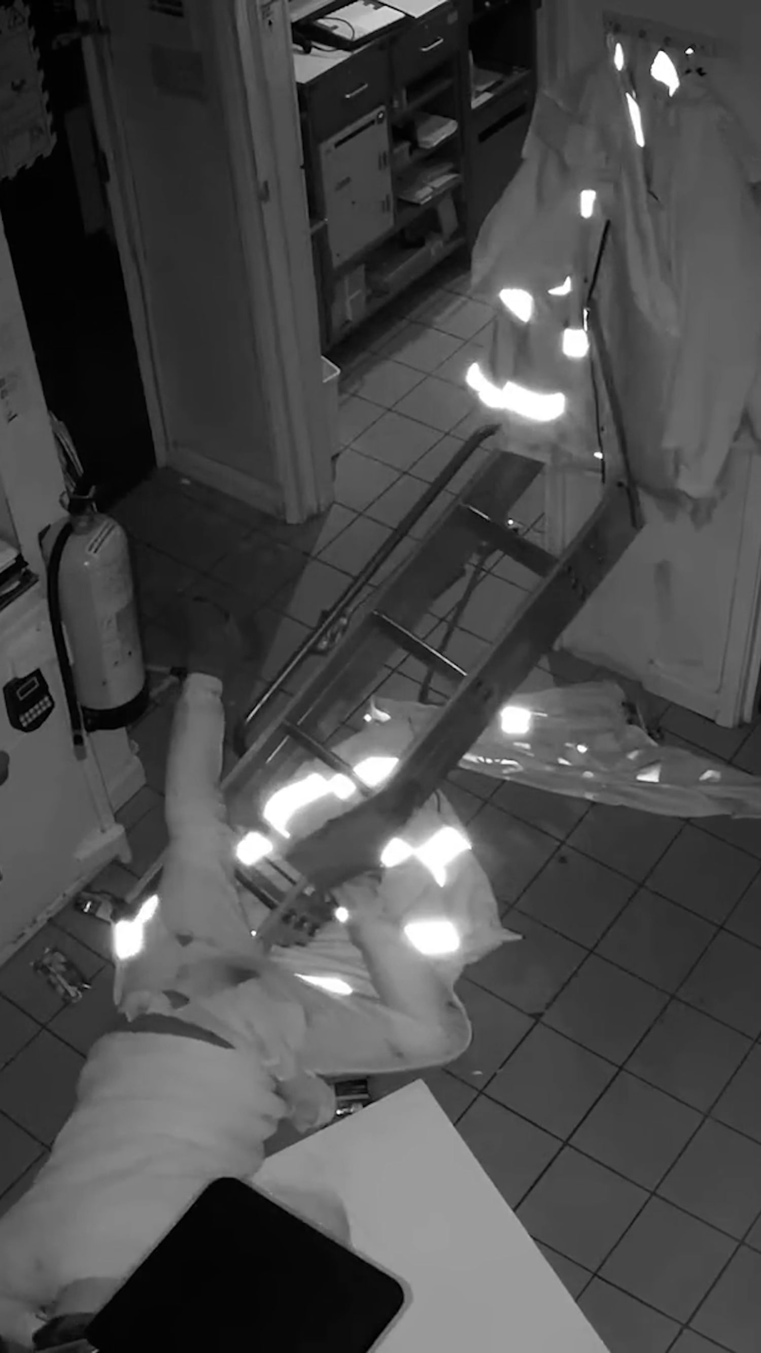 Burglar's fumbled escape caught on camera