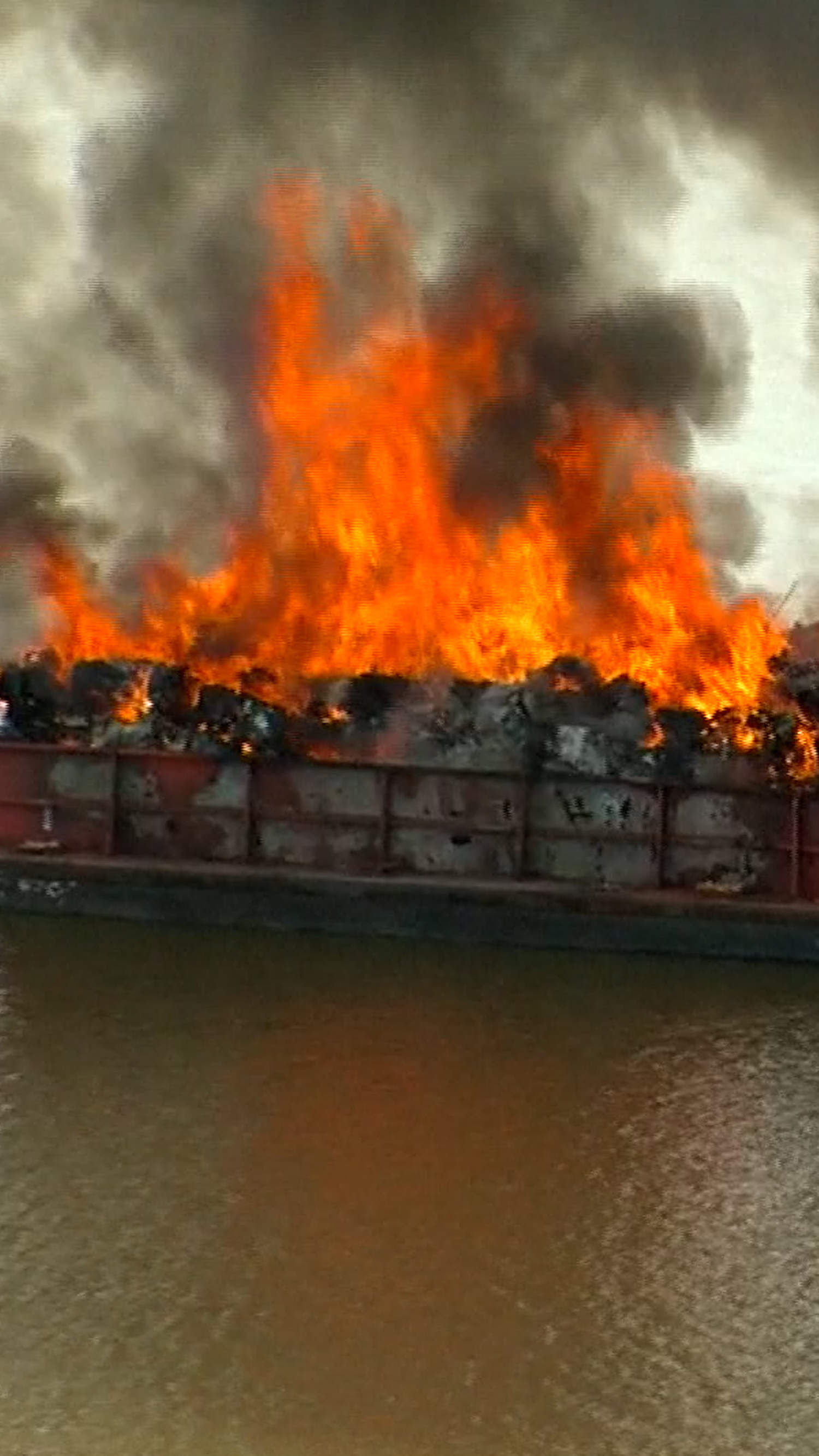 Barge catches fire on Alabama river