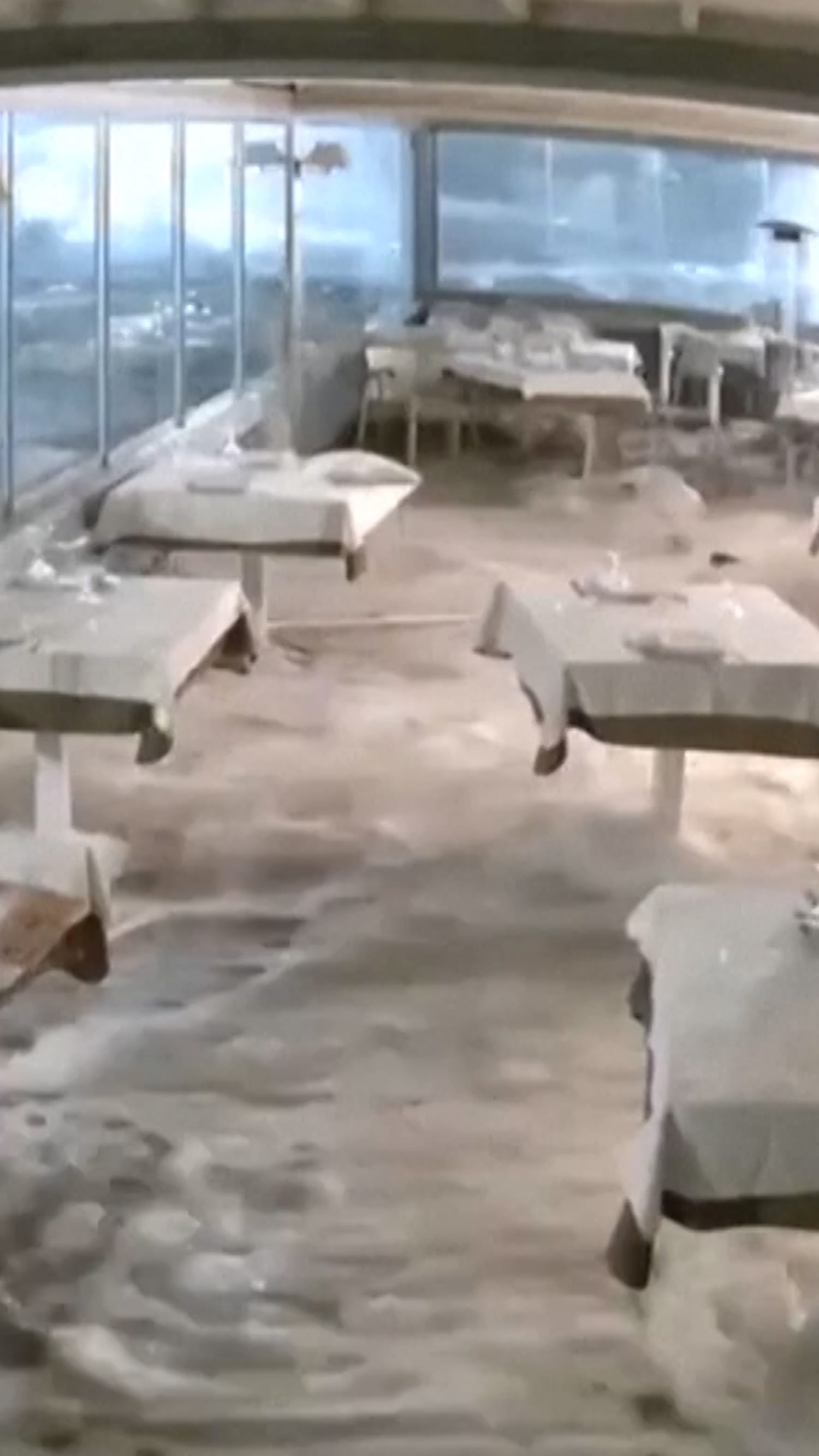 Video shows storm surge flood restaurant in Sicily