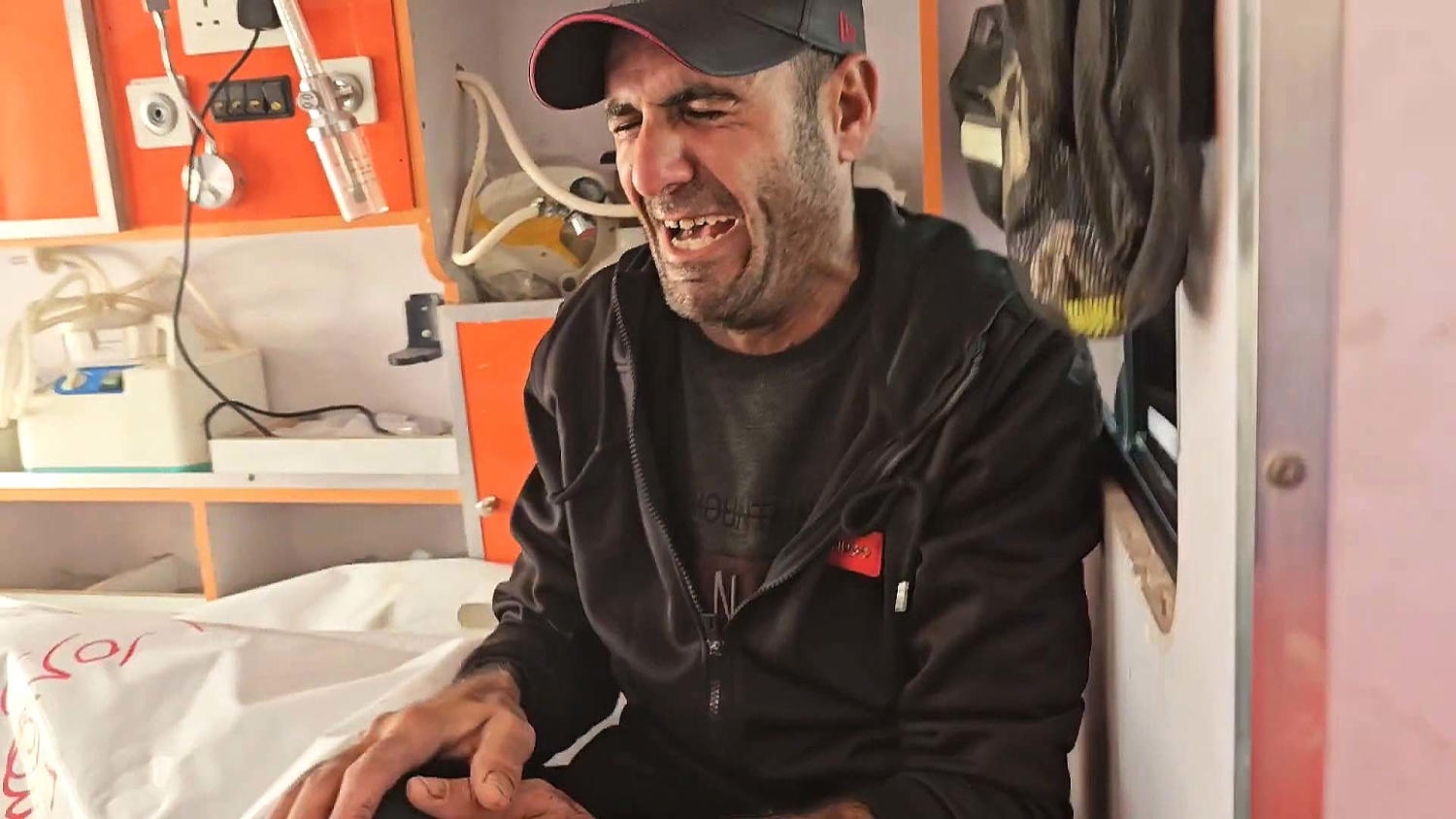 Grief-stricken father cries for daughters killed by Israeli missile in Gaza