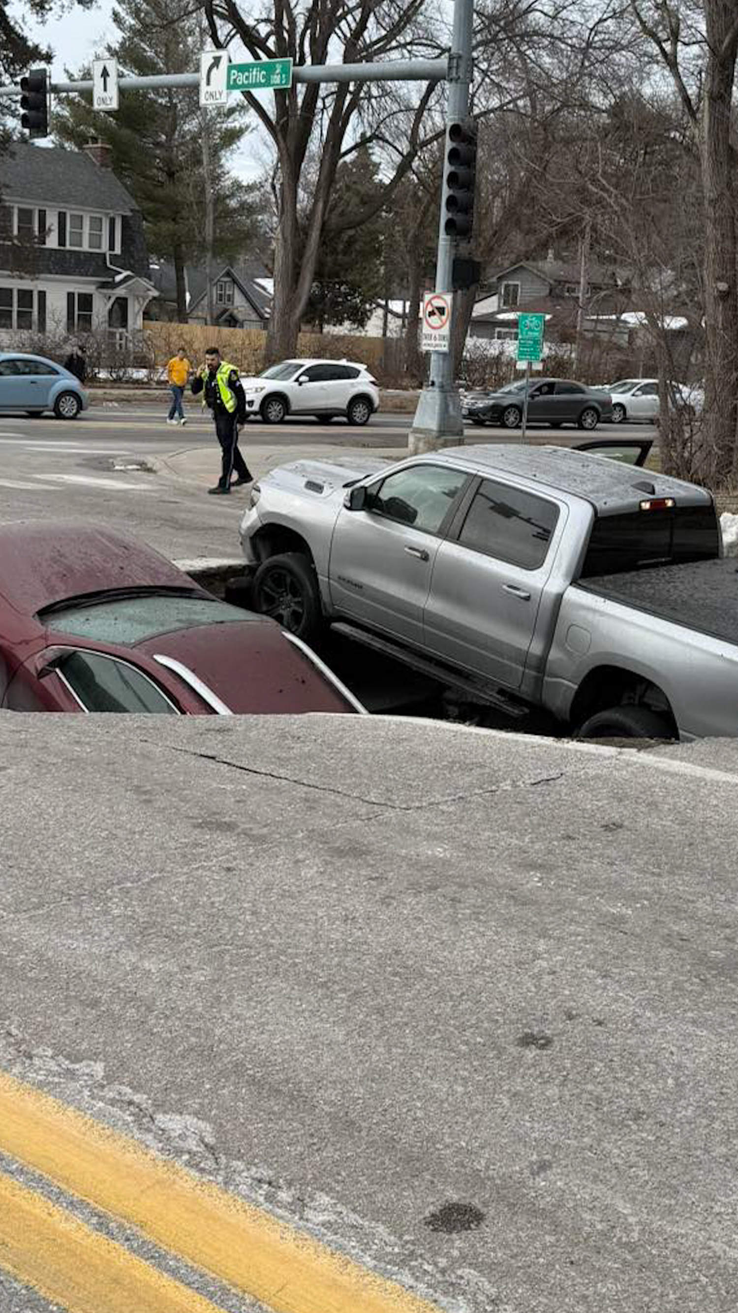 Sinkhole swallows up cars at Nebraska intersection