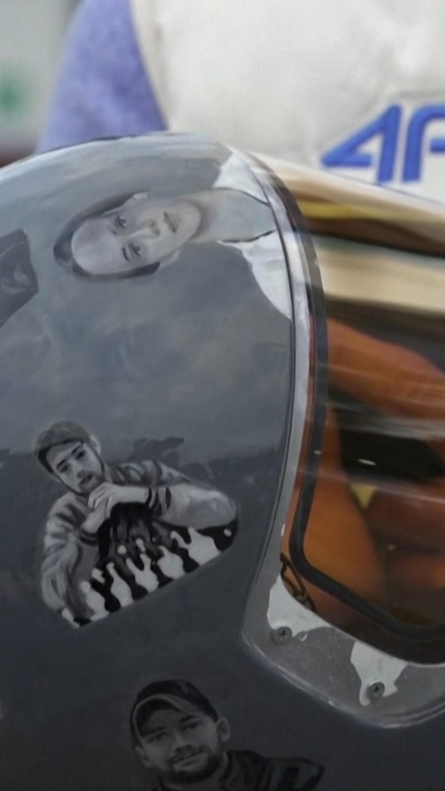 Ukrainian told he can't use helmet showing war victims