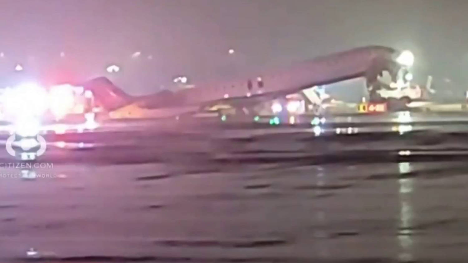 At least four injured in collision between plane and vehicle at NYC LaGuardia Airport