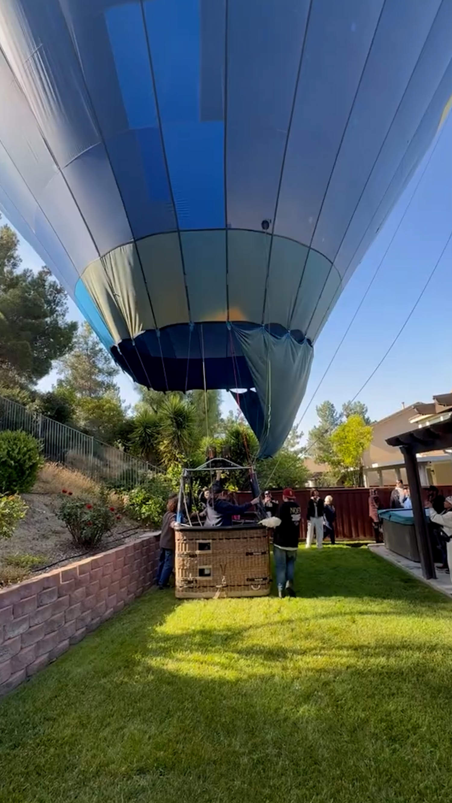 Hot-air balloon makes emergency landing in backyard